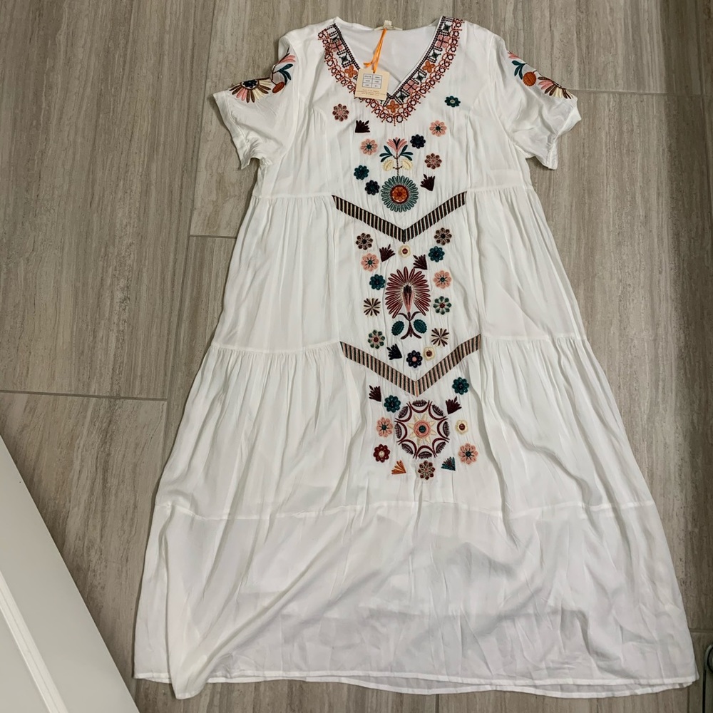 White embroidered v neck dress